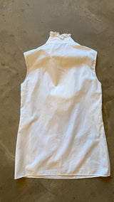 White Ruffle Sleeveless Blouse
