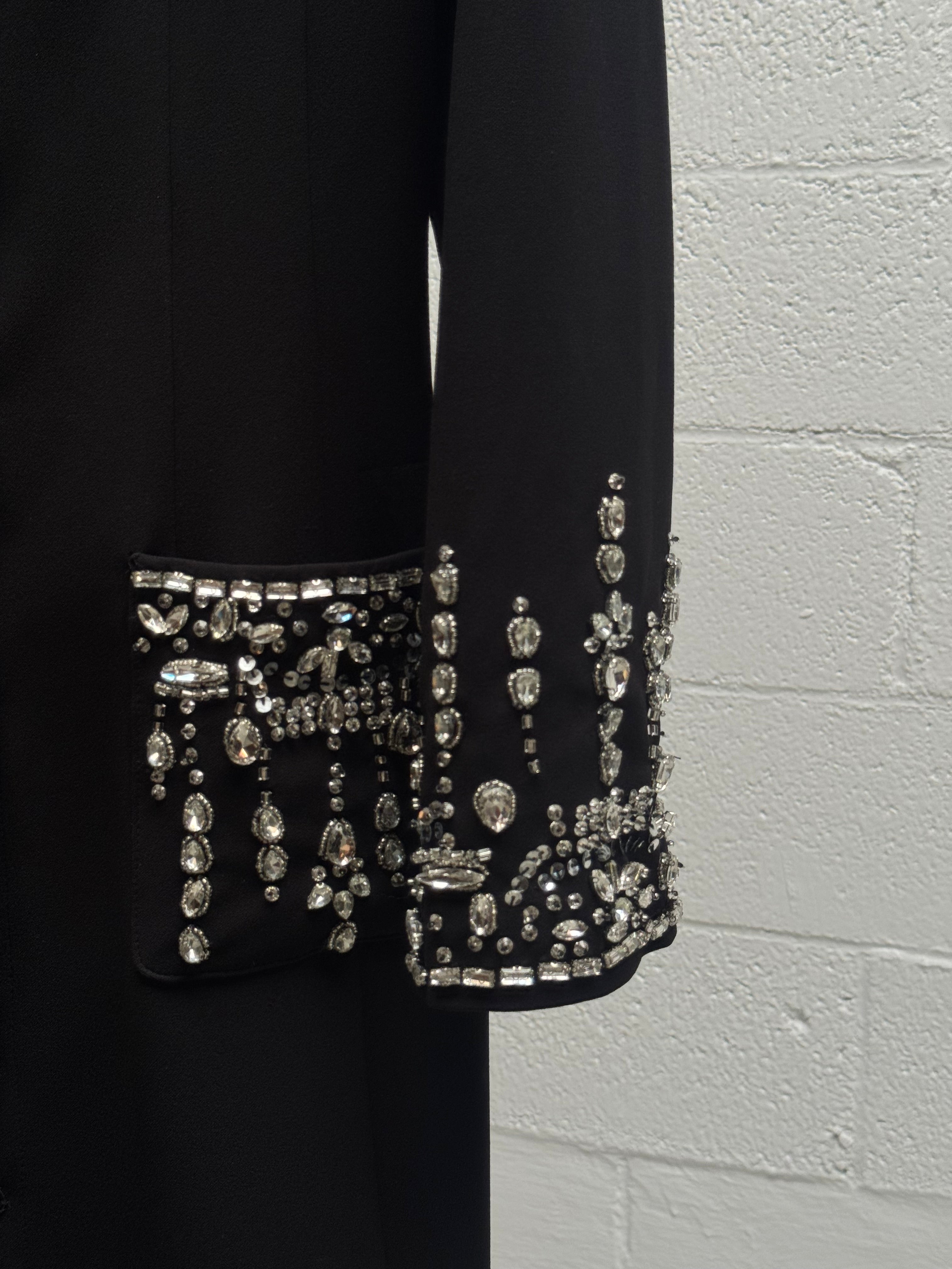 Coat with embellishment