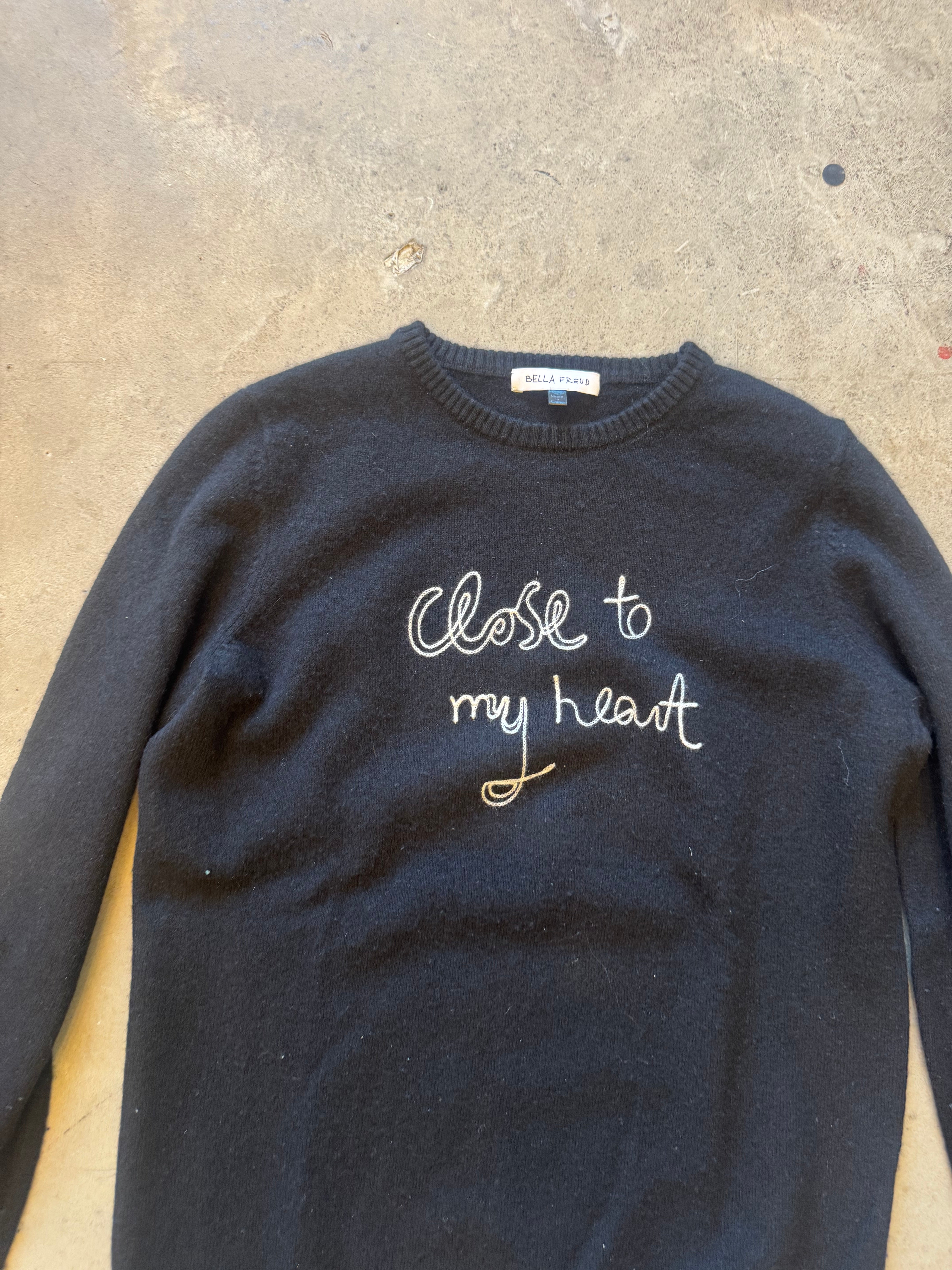 Black cashmere “close to my heart” sweater