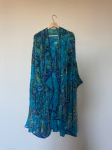 Blue Poncho with beading