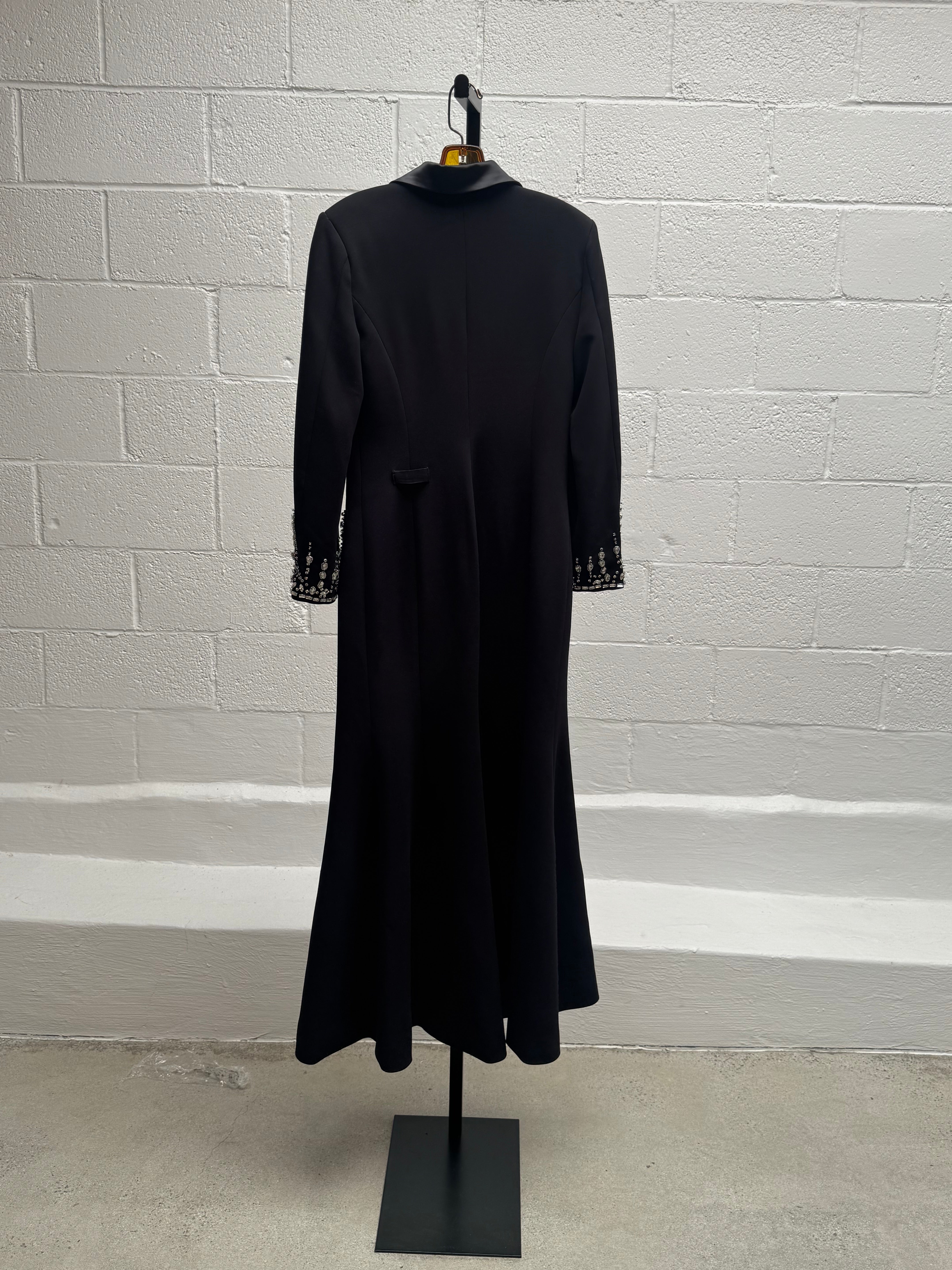 Coat with embellishment