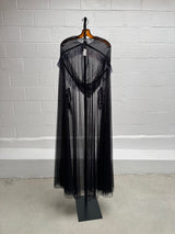 Cape with metallic fringe details
