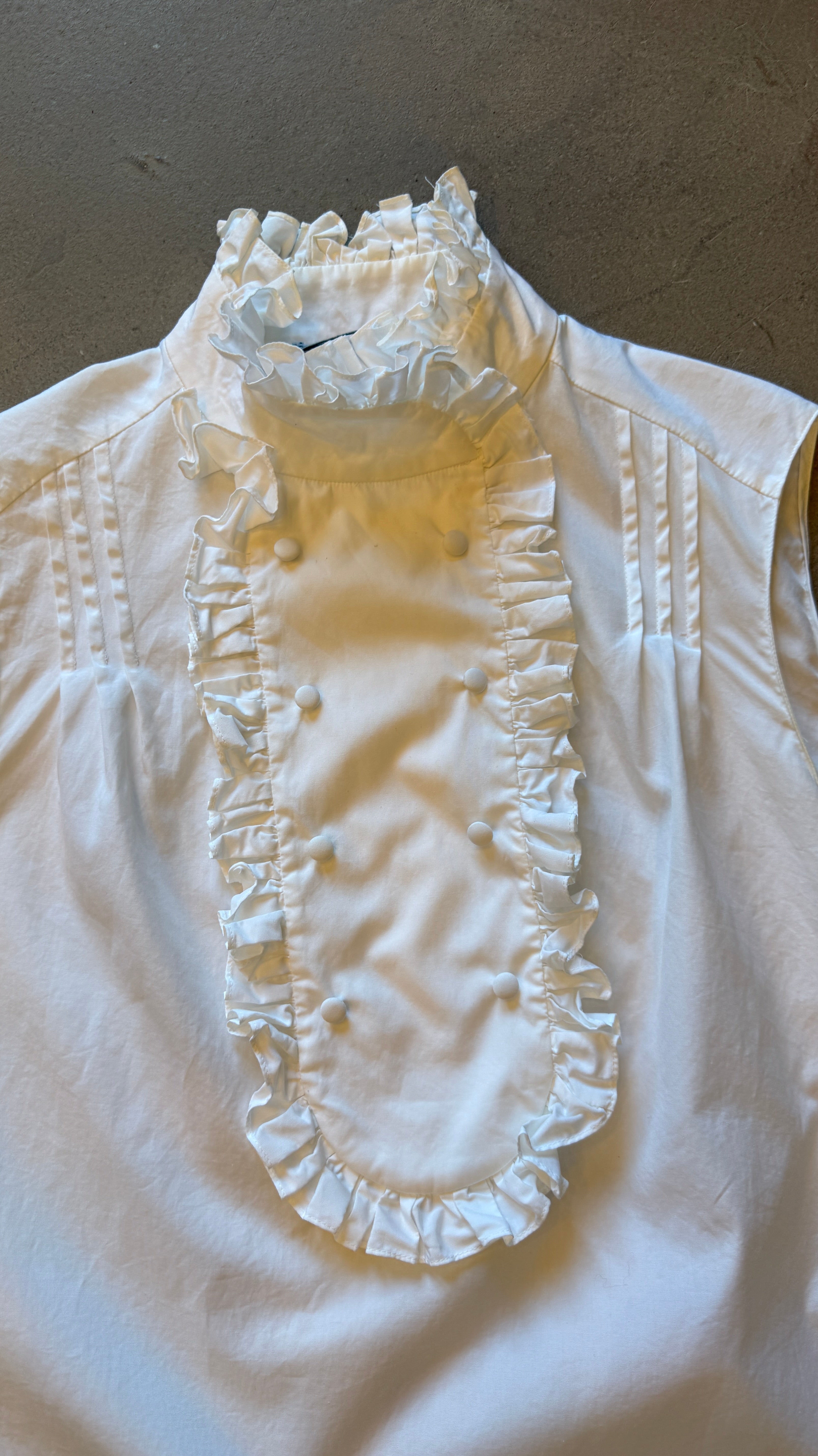 White Ruffle Sleeveless Blouse