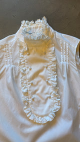 White Ruffle Sleeveless Blouse
