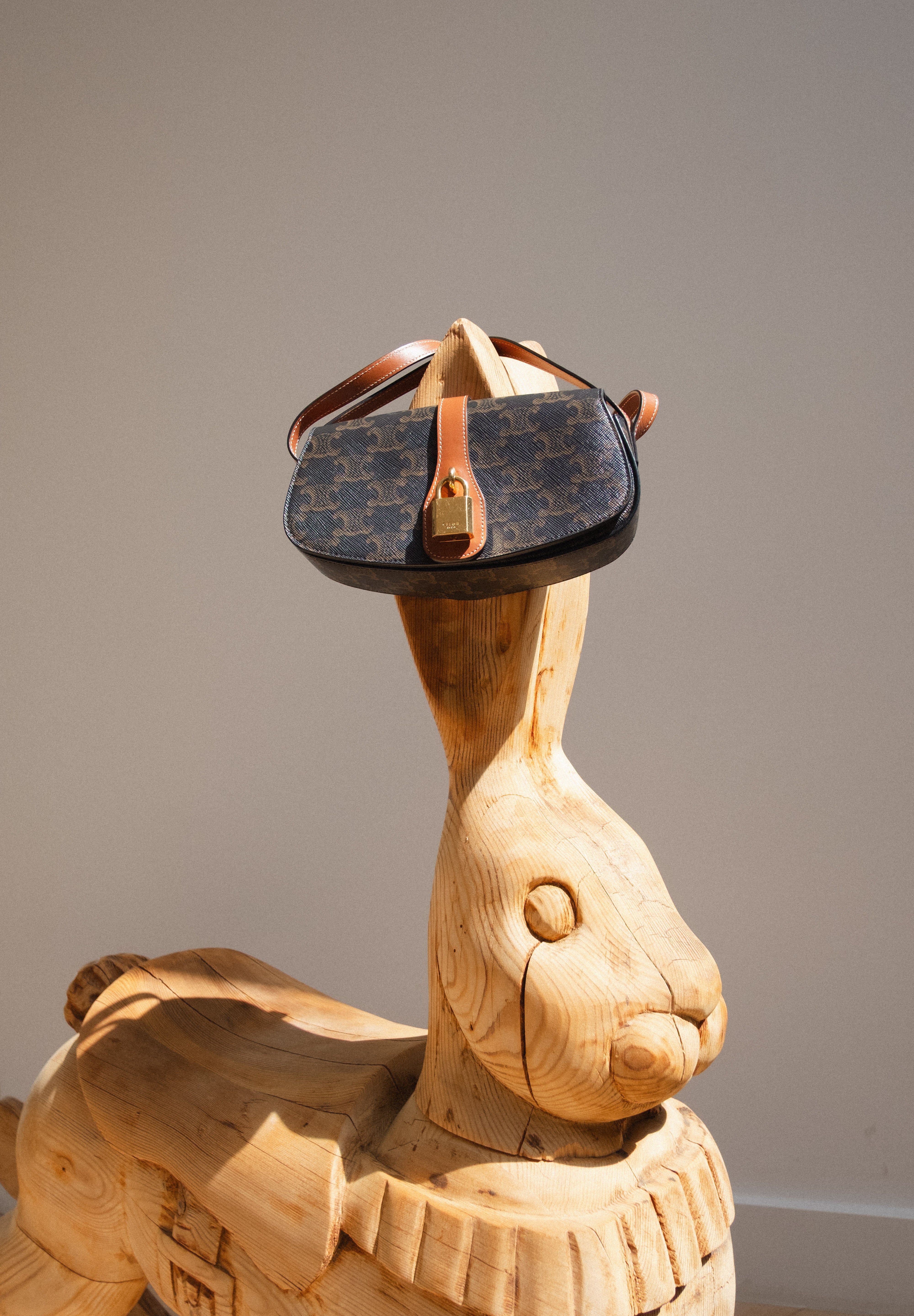 Triomphe Tabou Clutch on Strap
