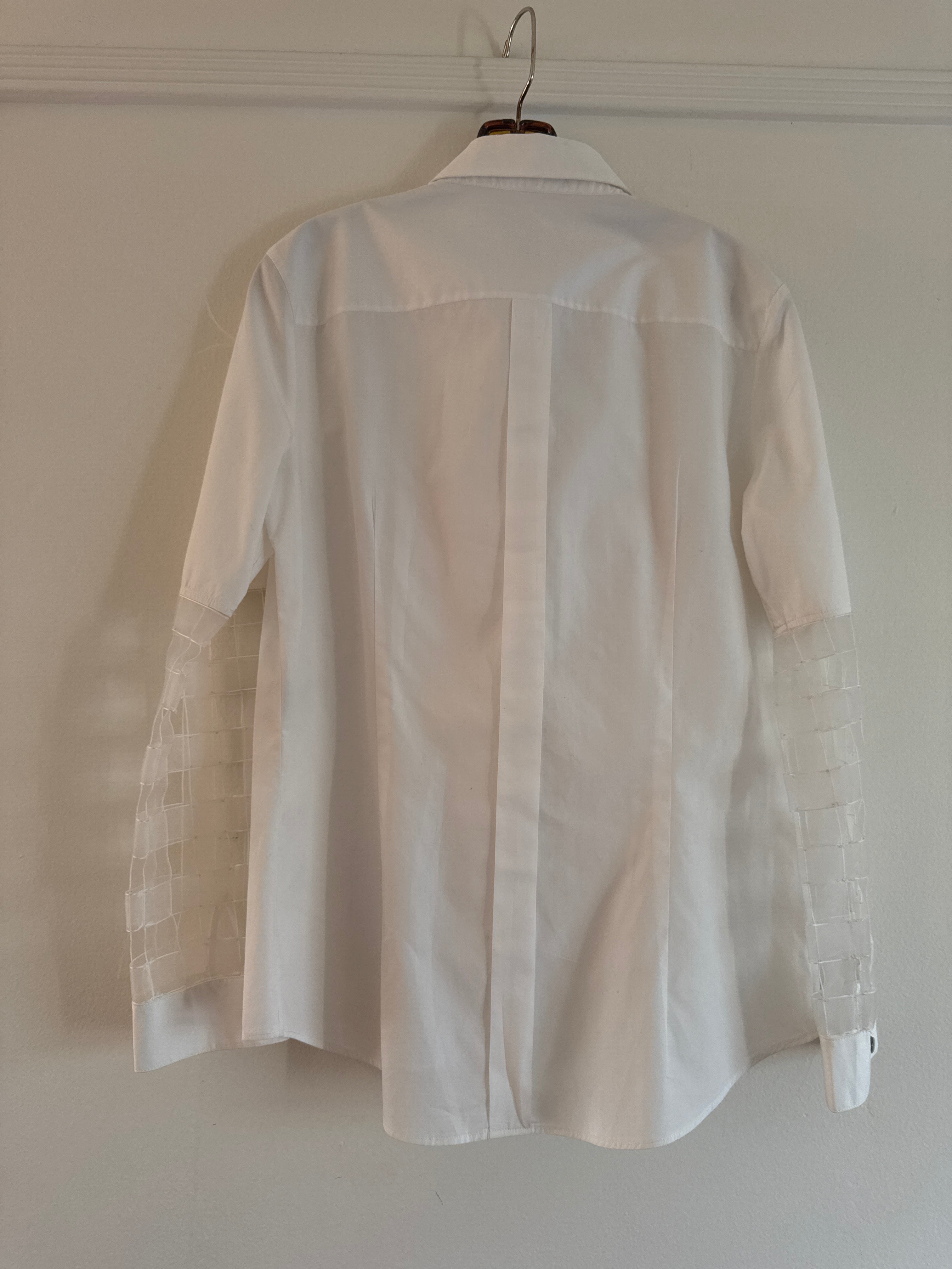 Shirt with feathers