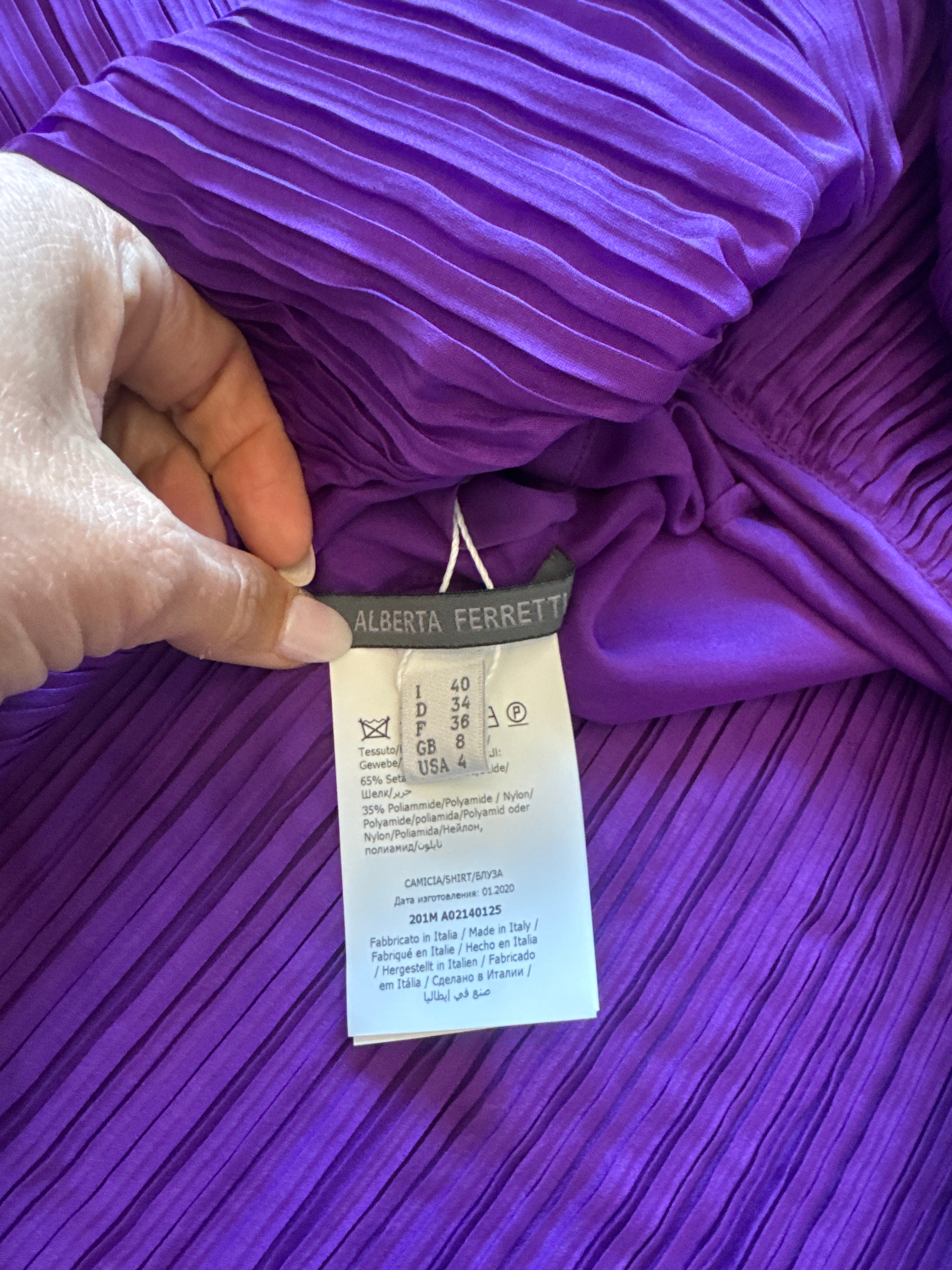 Purple Winged Top