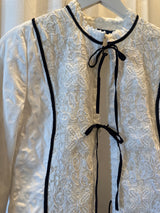 White Embroidery with black bows