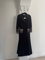 Coat with embellishment