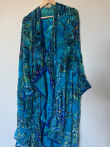 Blue Poncho with beading