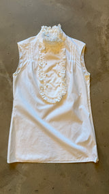 White Ruffle Sleeveless Blouse