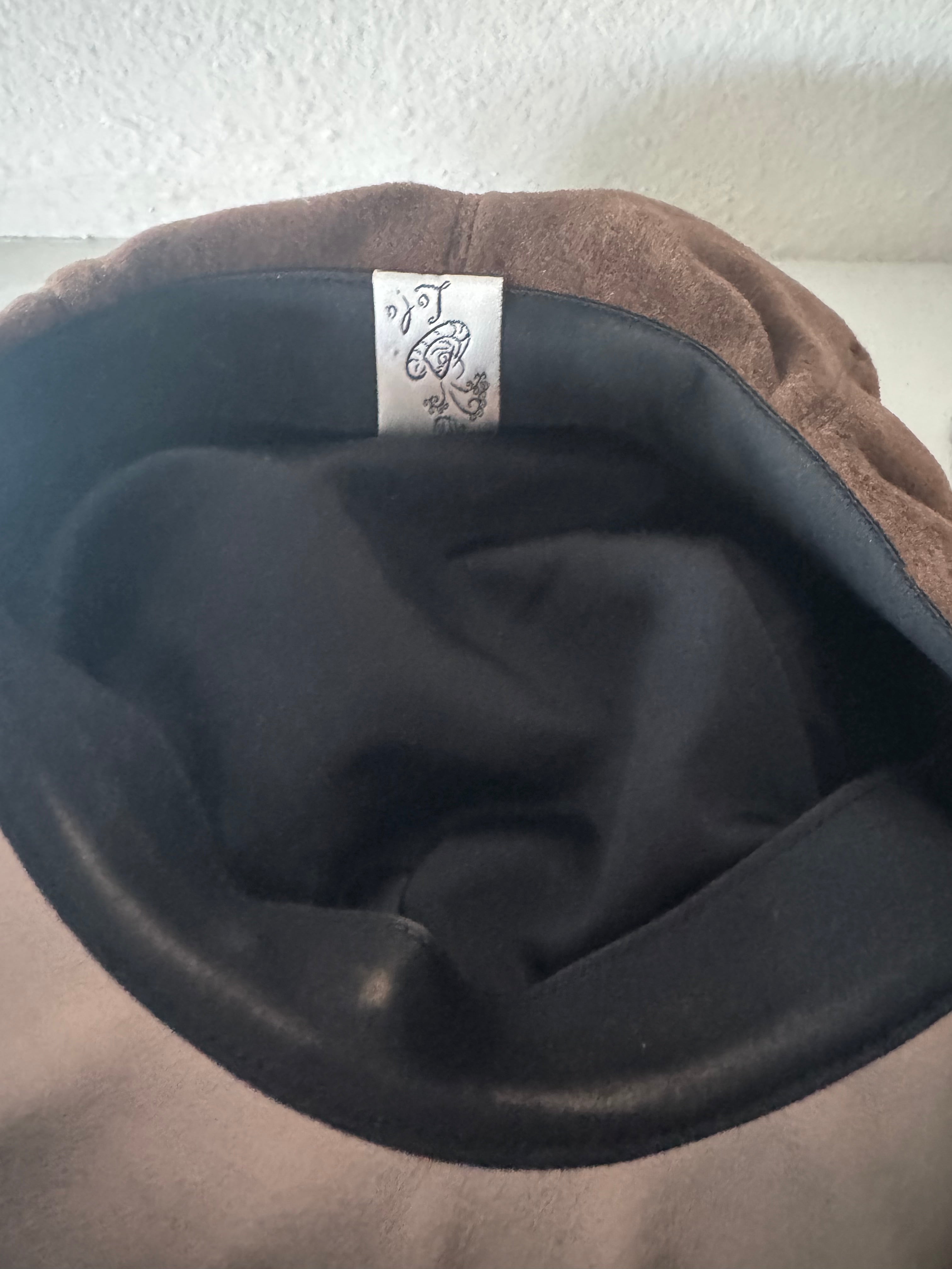 Brown hat with metalic cap