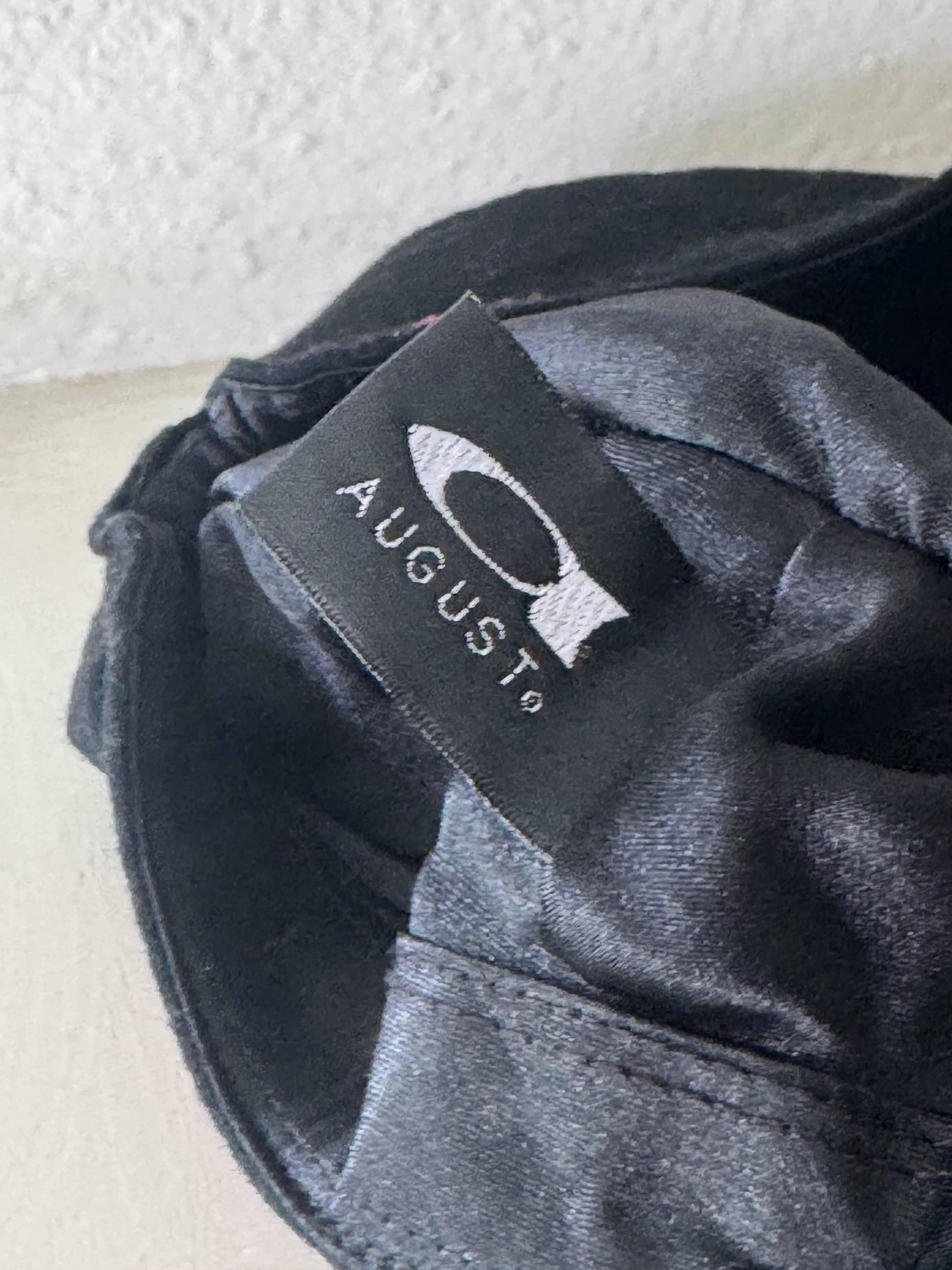 Cap with pink leather detail