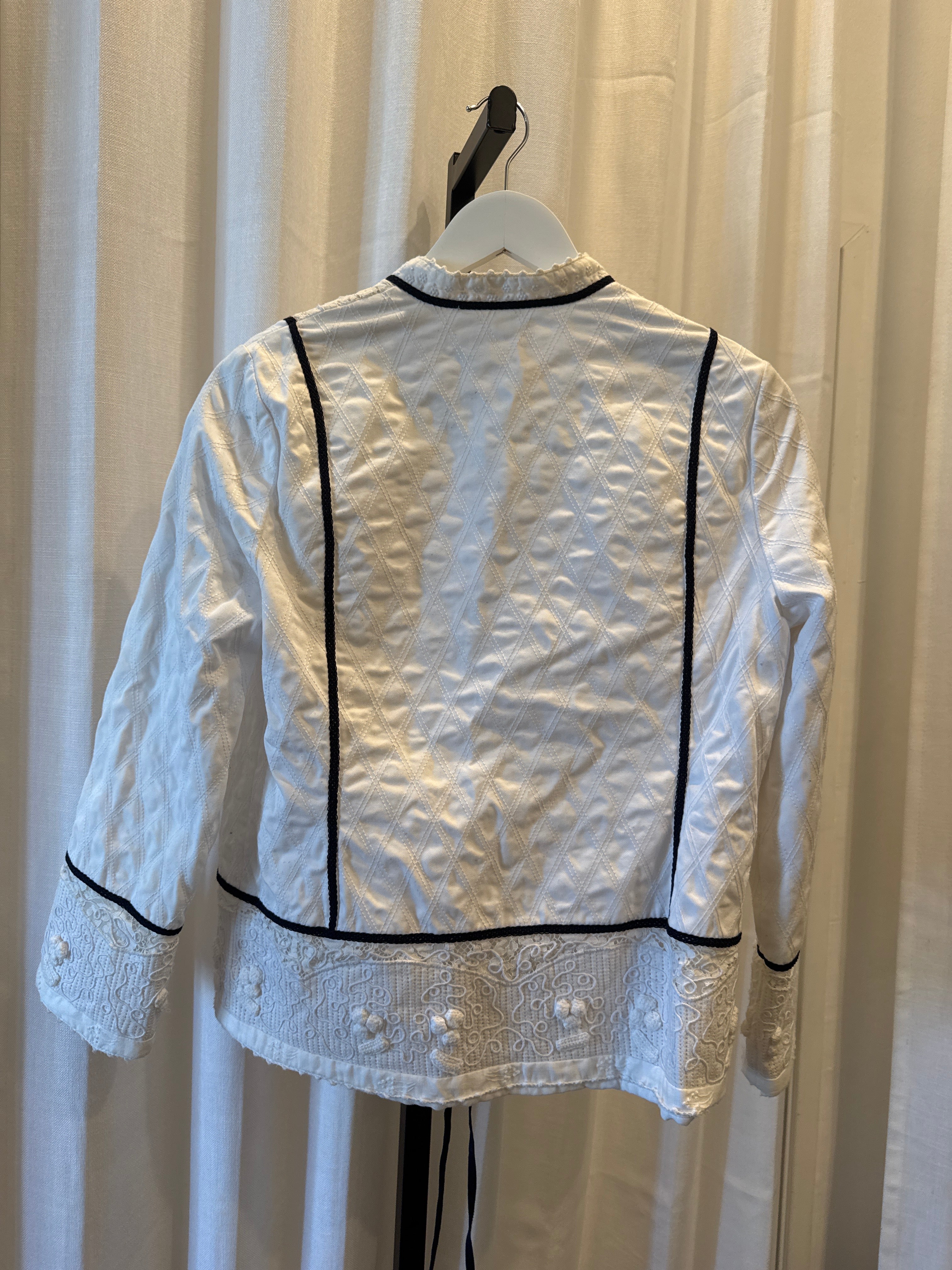 White Embroidery with black bows