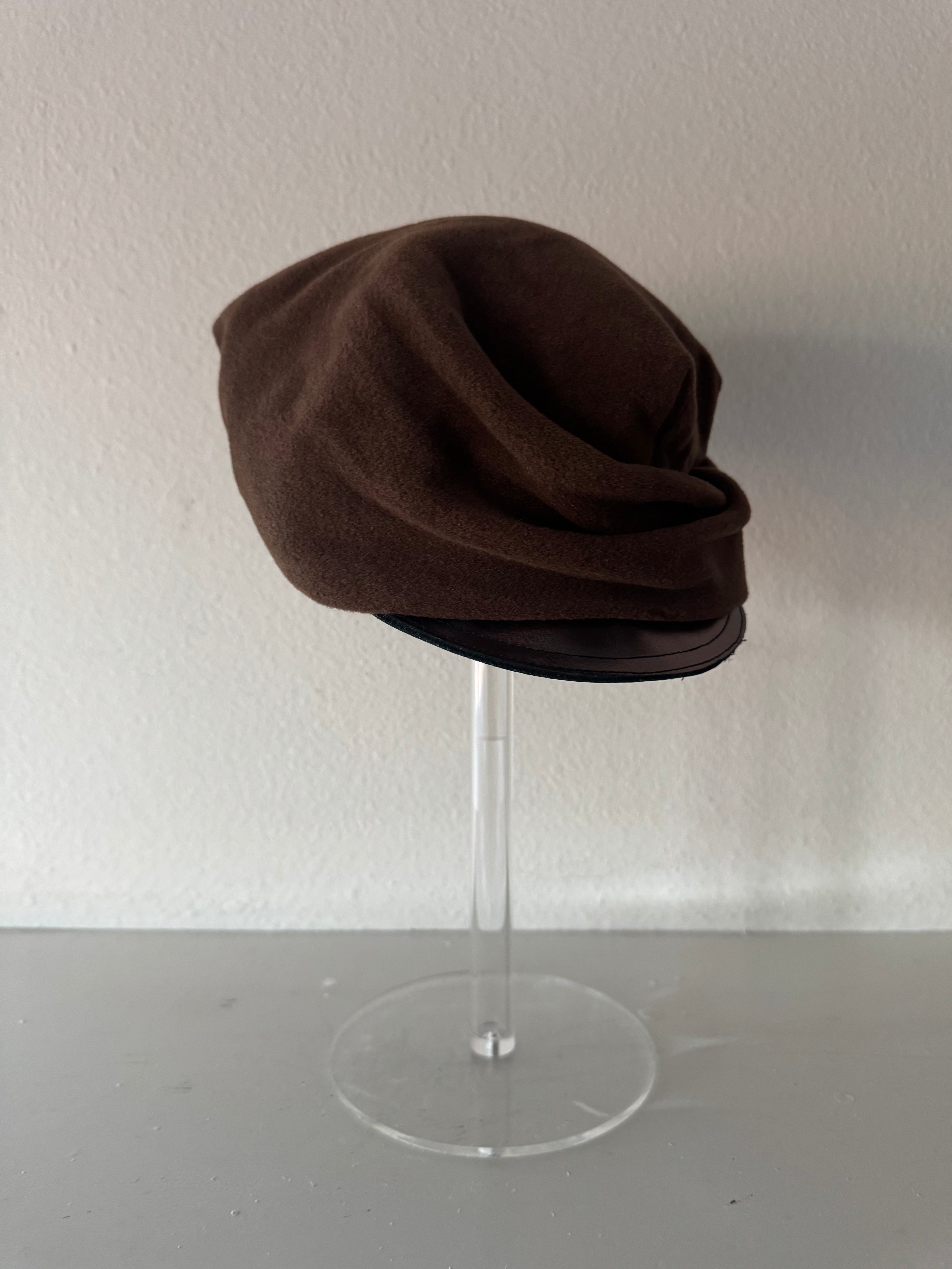 Brown hat with metalic cap