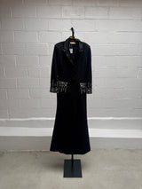 Coat with embellishment