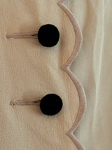 Peach Blouse with black velvet buttons