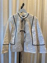 White Embroidery with black bows