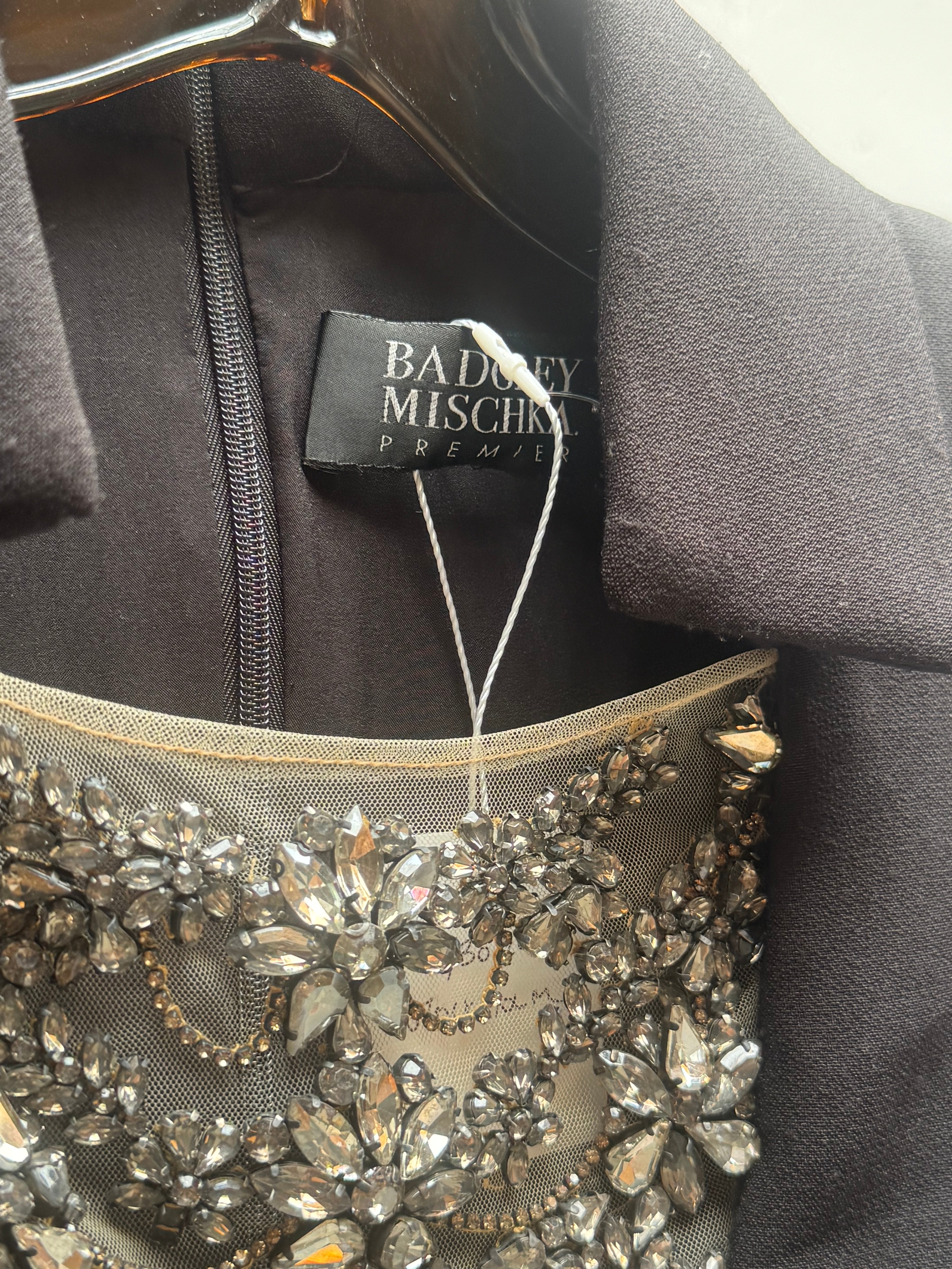 Dress with embellishing on front chest