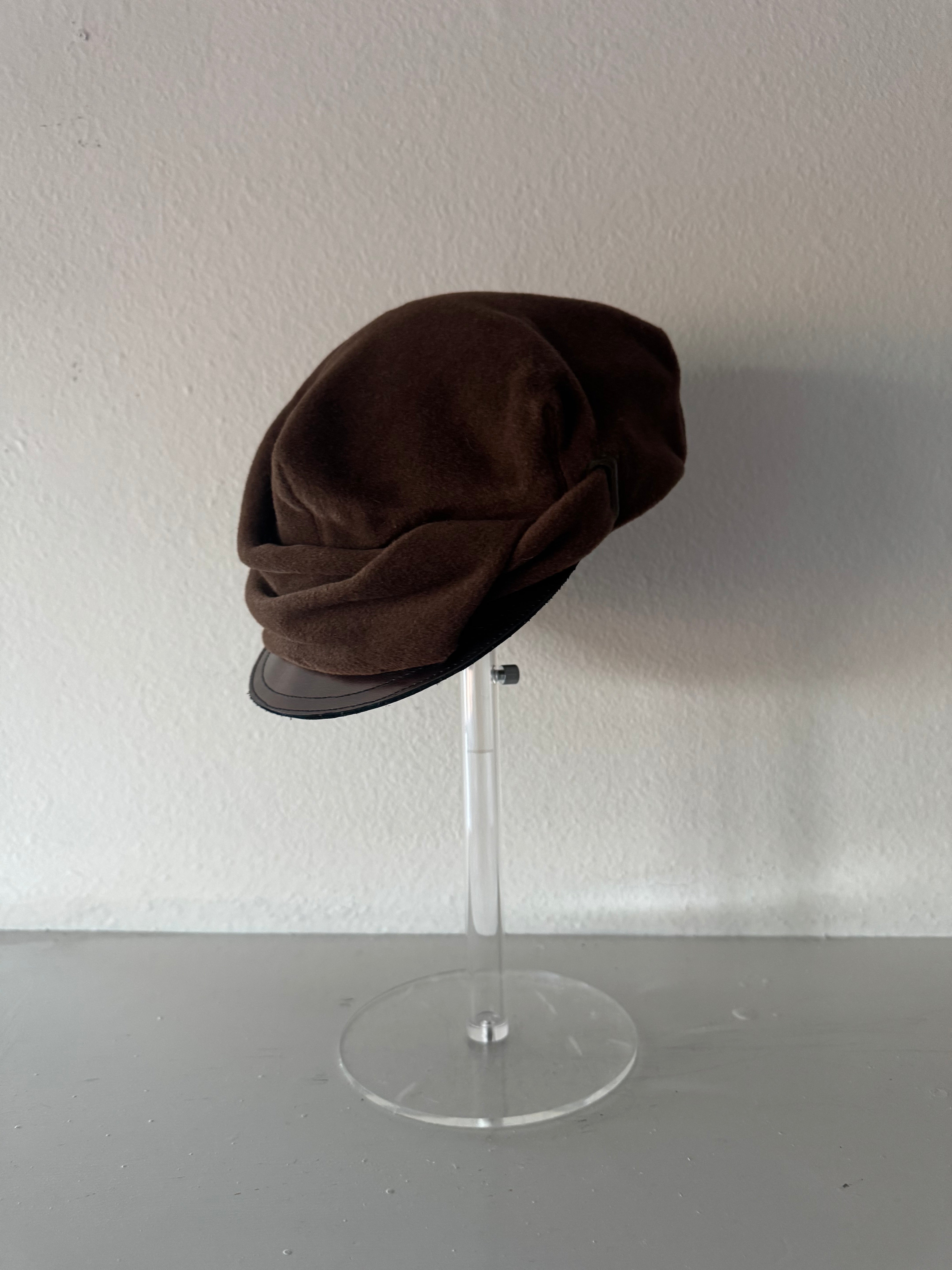 Brown hat with metalic cap