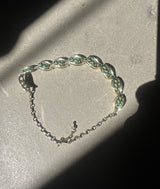 Gold necklace with green stones