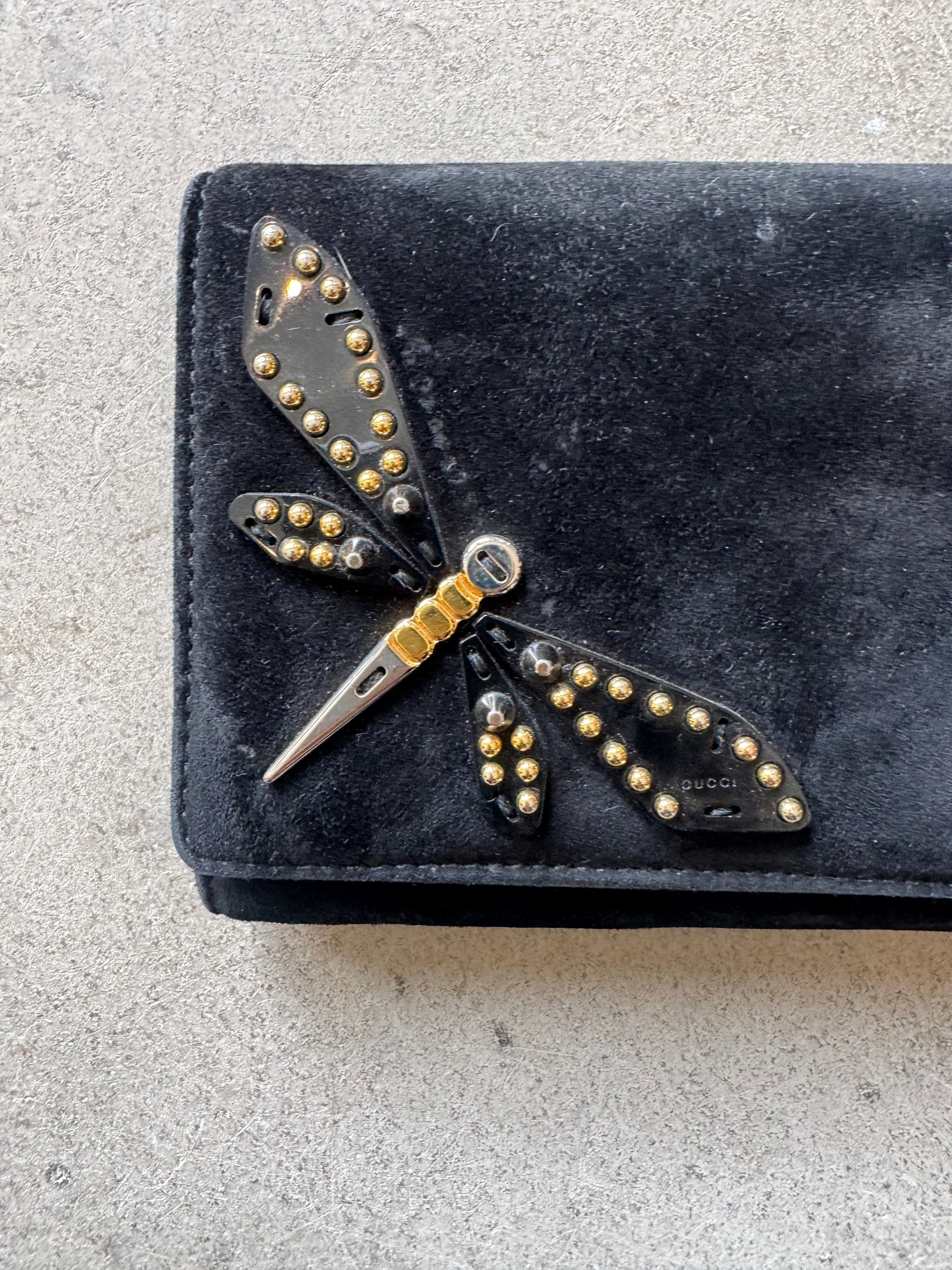 Suede clutch with butterfly
