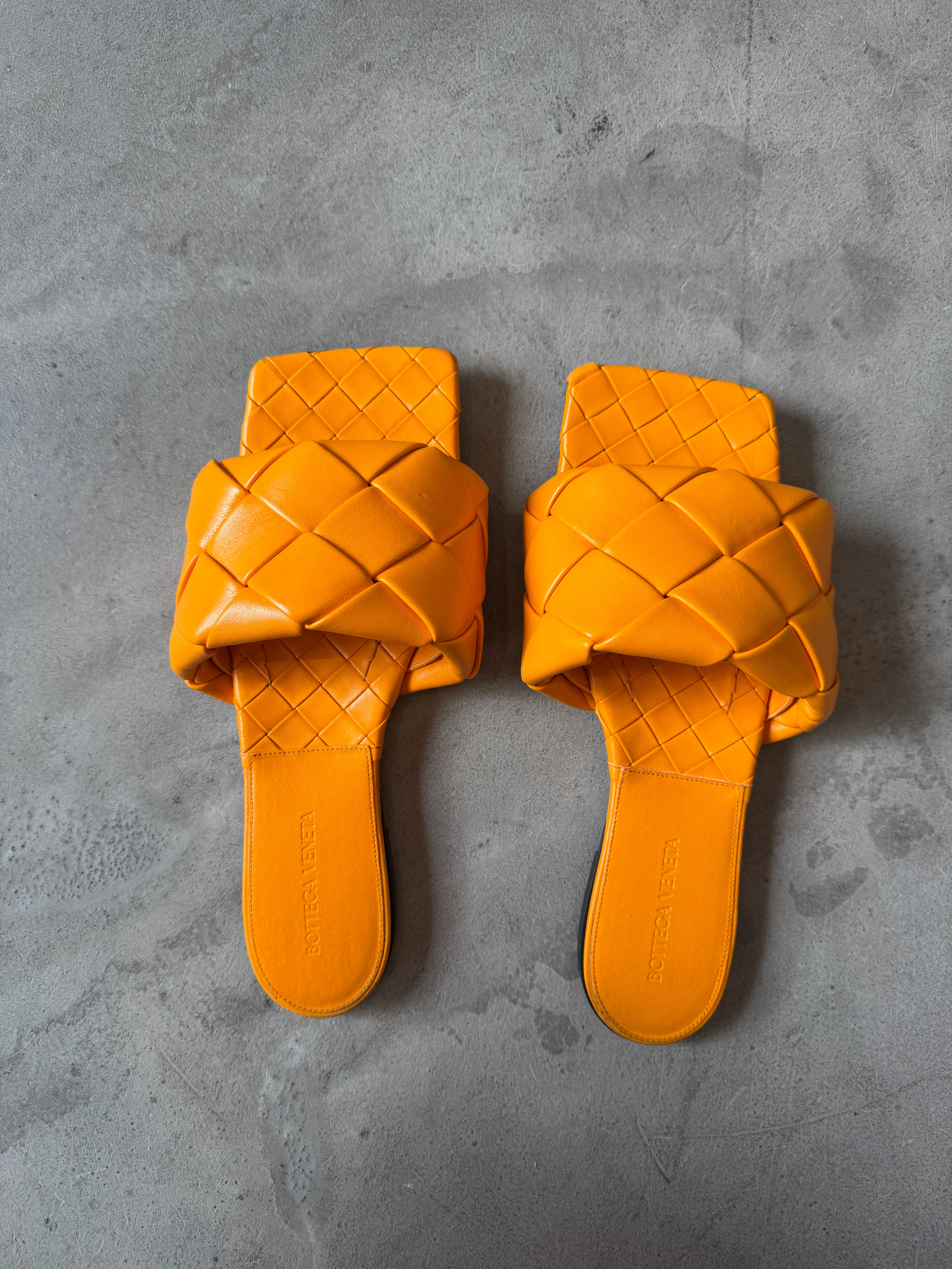 Orange woven slide