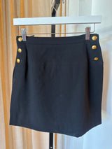 Flap skirt with gold buttons