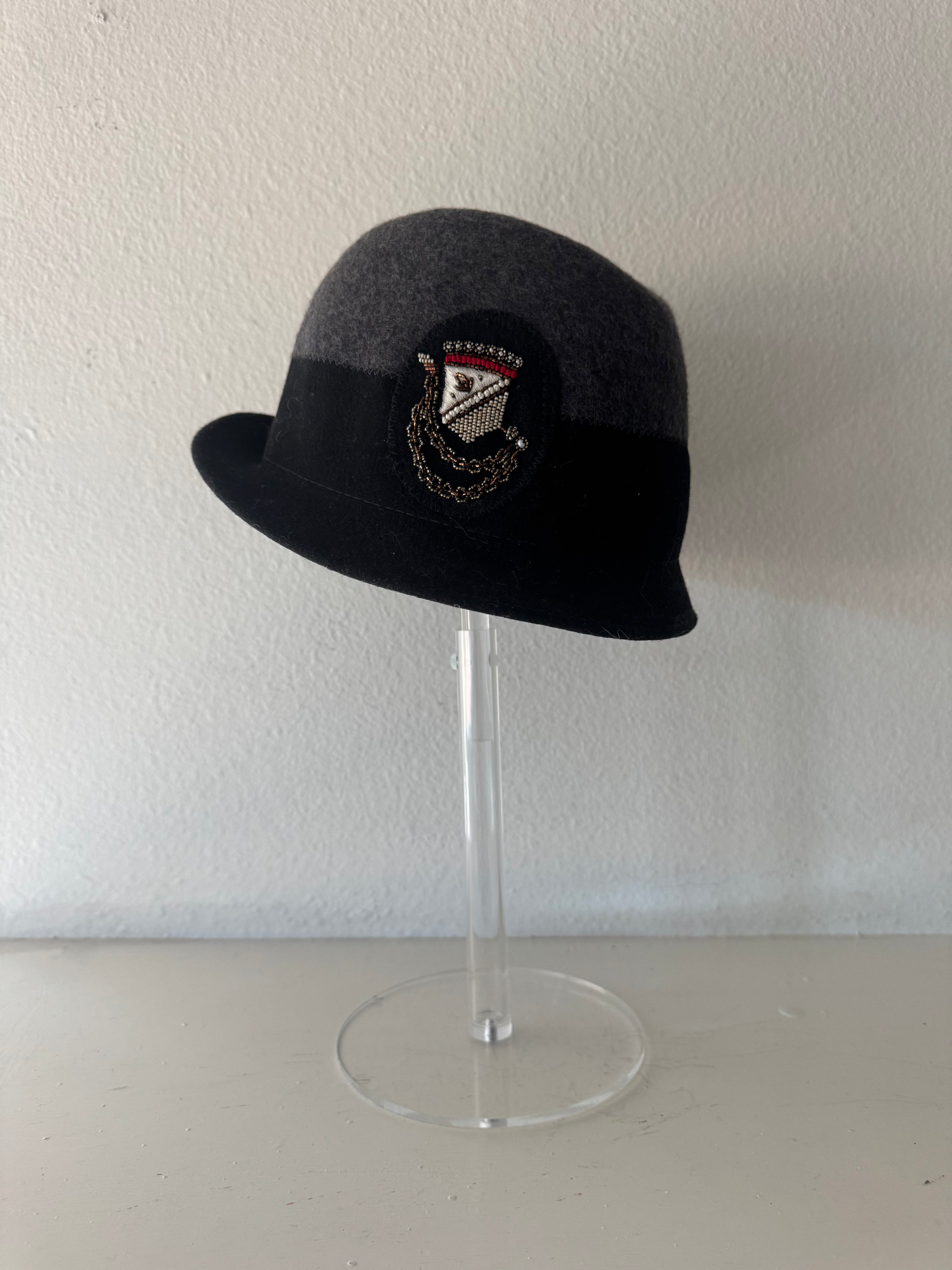 Gray and Black hat with patch
