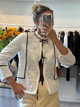 White Embroidery with black bows