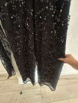 Chic Black Sequin Long Sleeve Jumpsuit with Sheer Detailing
