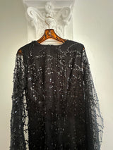 Chic Black Sequin Long Sleeve Jumpsuit with Sheer Detailing