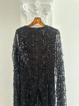 Chic Black Sequin Long Sleeve Jumpsuit with Sheer Detailing