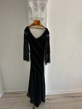 Elegant Black Evening Gown with Sheer Sleeves and Sequin Details