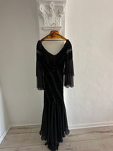 Elegant Black Evening Gown with Sheer Sleeves and Sequin Details