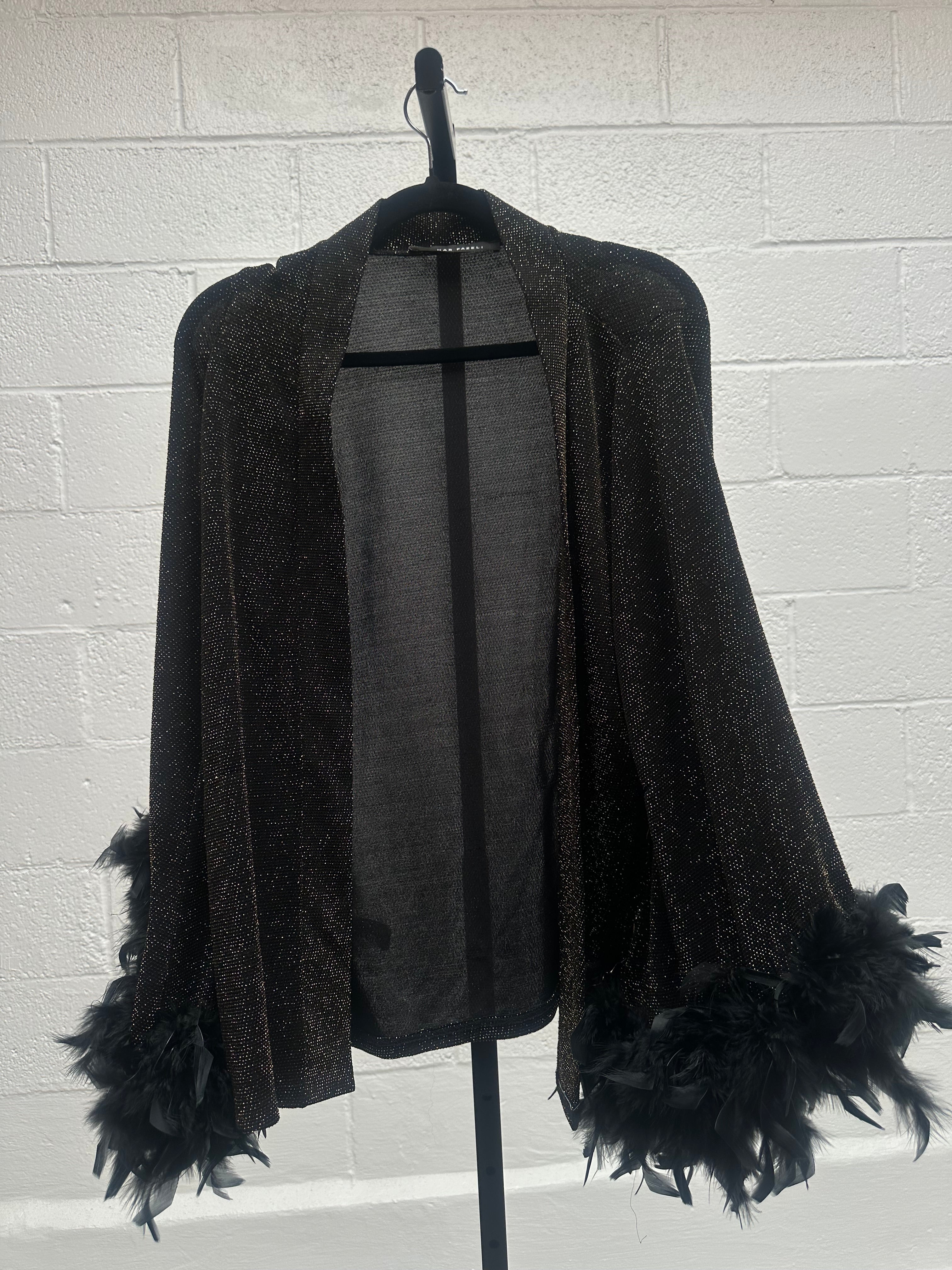 Glitter Jacket Pant and Top Set with feather sleeves.