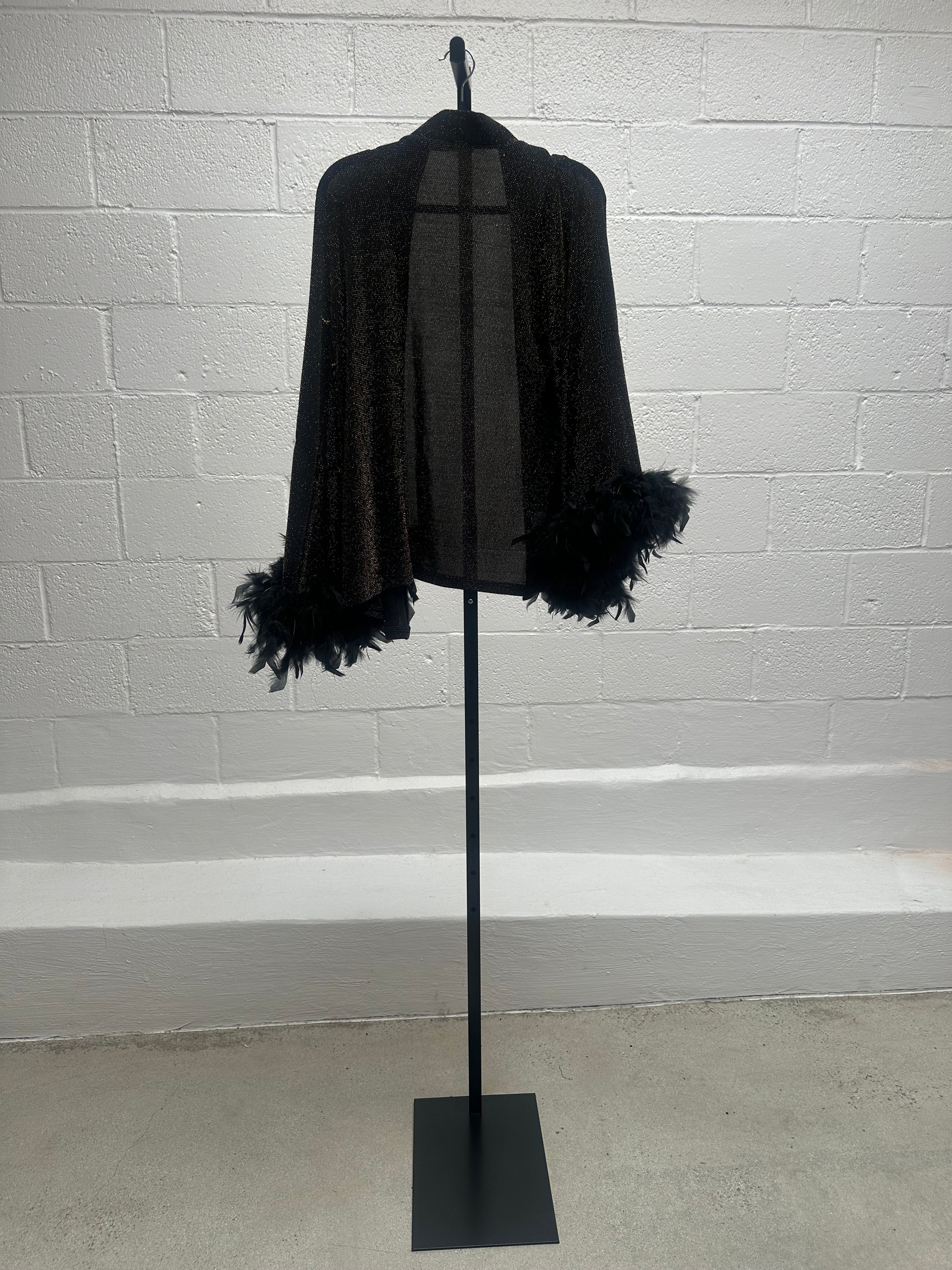 Glitter Jacket Pant and Top Set with feather sleeves.