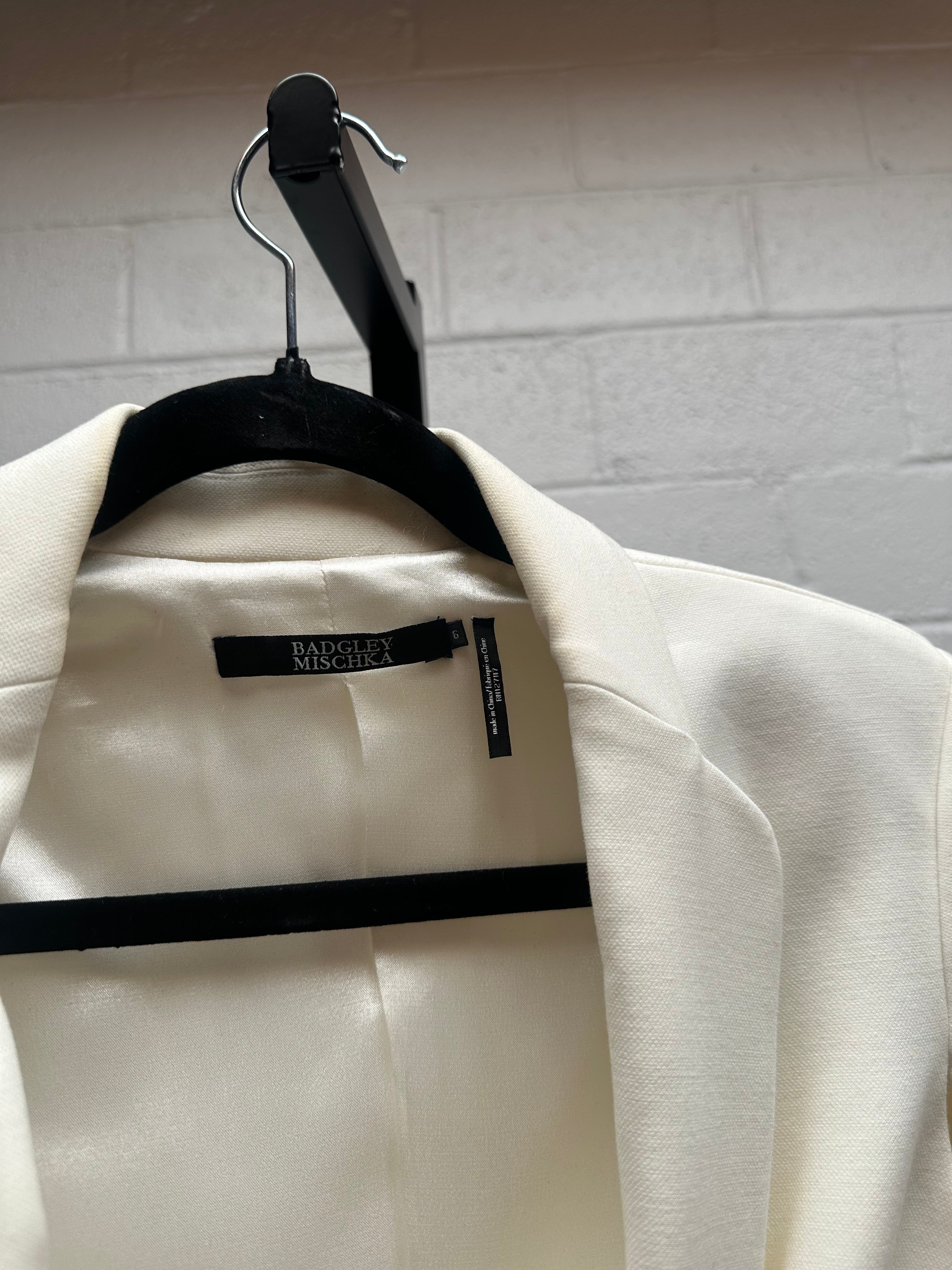 Cream Cape/Blazer with trousers